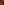         Three red chili peppers on a textured surface.